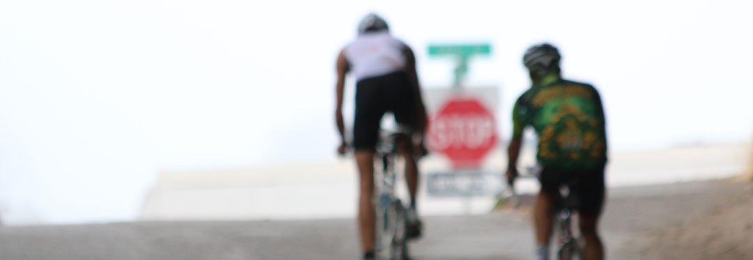 climbing hill on bike at start of vineman triathlon