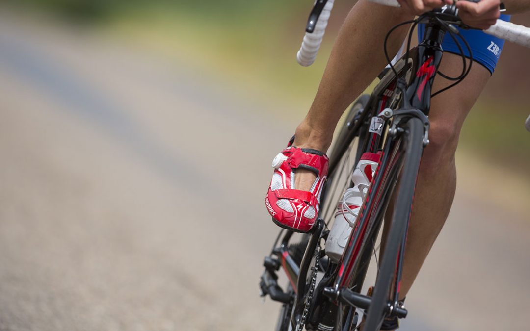 triathlete pedaling on a bike